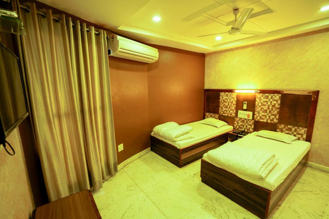 Hotel Ashiana Jamnagar Bagian luar foto